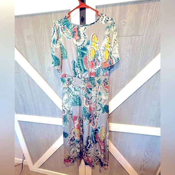 389. Butterfly print, smocked empire waist, flutter sleeves fully lined dress - Picture 2 of 4